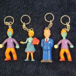 collection of vintage McDonald's Happy Meal toy keychains from the 1999  Doug